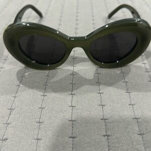 Green Loewe sunglasses with gold hardware. Excellent condition.